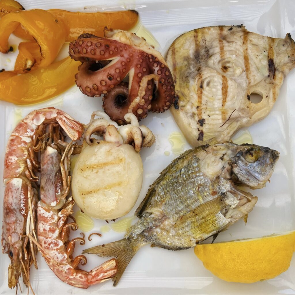 Fresh fish grill, Miramare da Michele restaurant, Torre Santa Sabina Puglia by food. A virtual tour of Puglia’s best food, dishes, restaurants. Puglia is one of Italy’s top foodie destinations | Photo © the Puglia Guys guides to gay Puglia, Italy’s top gay summer destination for LGBT travel