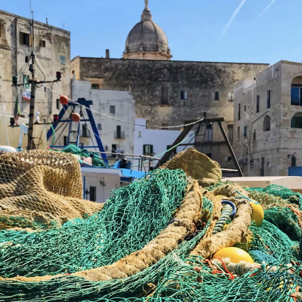 Fishermen dry their nets at Monopoli’s old fishing port.