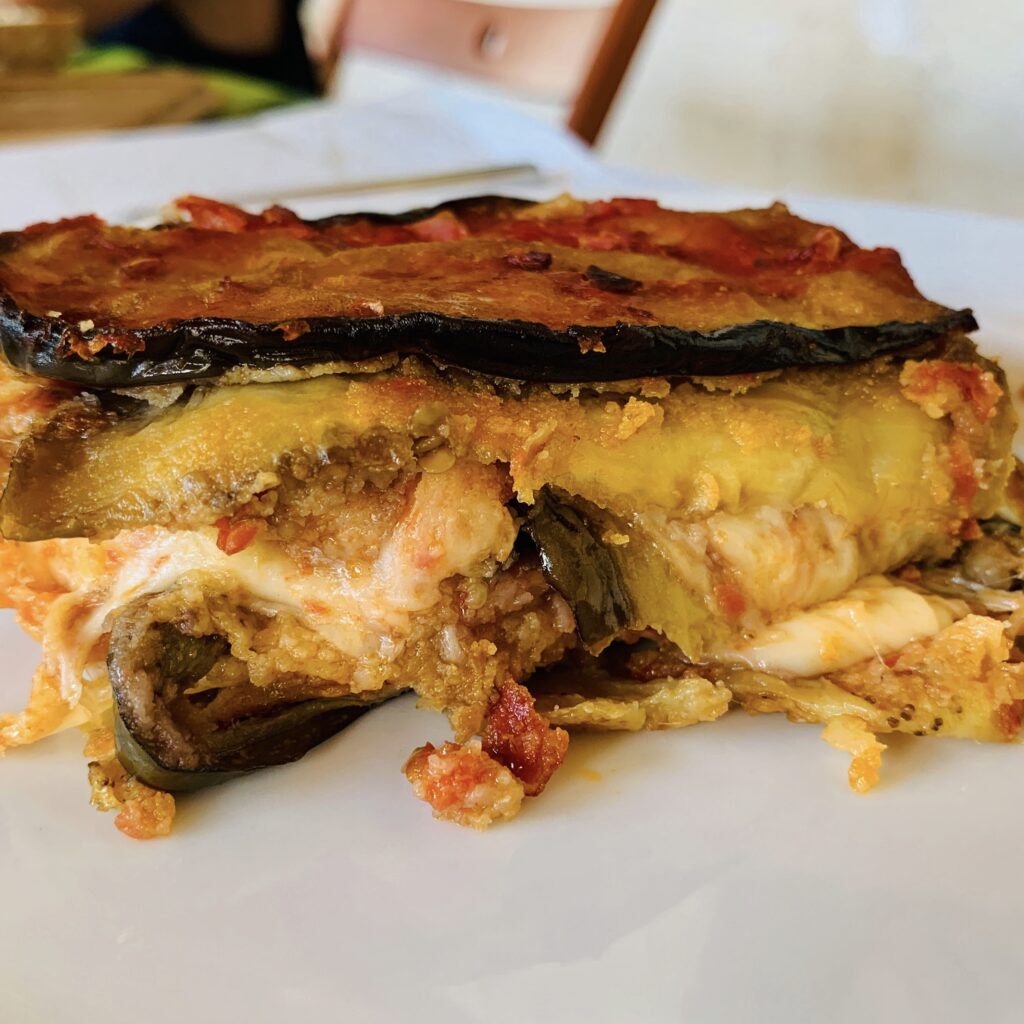 Parmigiana, homemade. Puglia by food. A virtual tour of Puglia’s best food, dishes, restaurants. Puglia is one of Italy’s top foodie destinations | Photo © the Puglia Guys for the Big Gay Podcast from Puglia guides to gay Puglia, Italy’s top gay summer destination for LGBT travel.