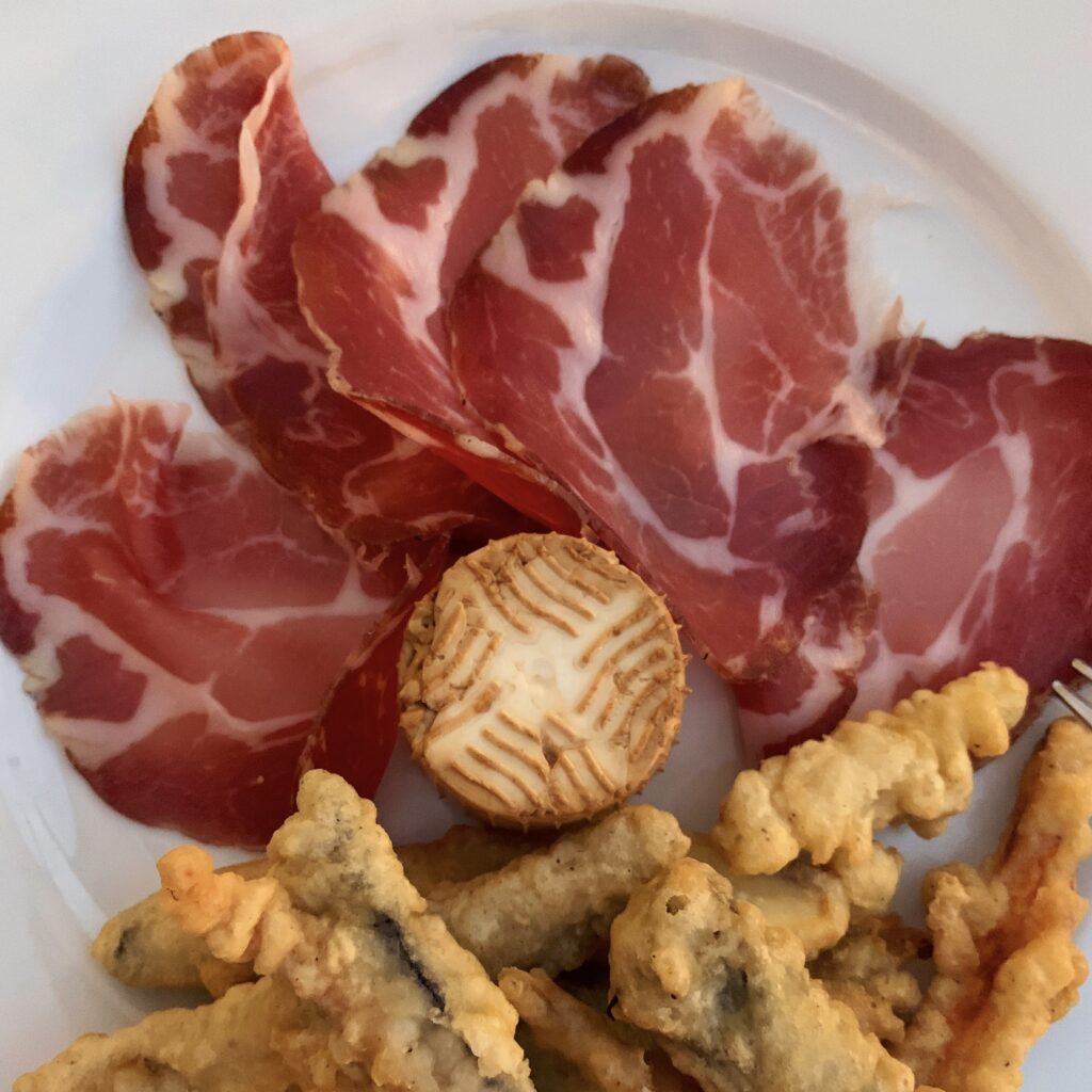 Capocollo di MArtina Franca, one of Puglia’s speciality regional cold cuts. Puglia by food. A virtual tour of Puglia’s best food, dishes, restaurants. Puglia is one of Italy’s top foodie destinations | Photo © the Puglia Guys for the Big Gay Podcast from Puglia guides to gay Puglia, Italy’s top gay summer destination for LGBT travel.