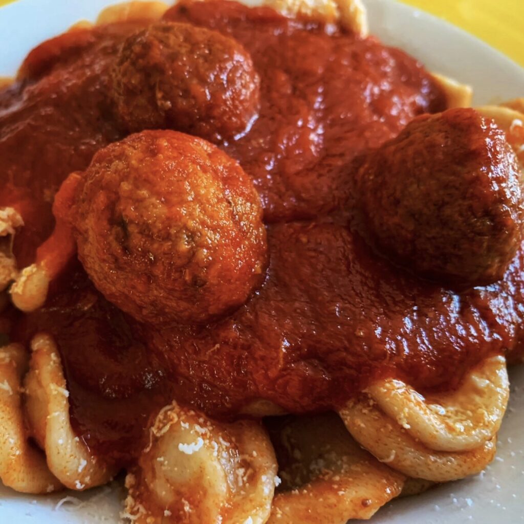 Homemade polpette al sugo. Pizza with local seasonal toppings, Luppolo & Farina restaurant, Latiano. Puglia by food. A virtual tour of Puglia’s best food, dishes, restaurants. Puglia is one of Italy’s top foodie destinations | Photo © the Puglia Guys for the Big Gay Podcast from Puglia guides to gay Puglia, Italy’s top gay summer destination for LGBT travel.