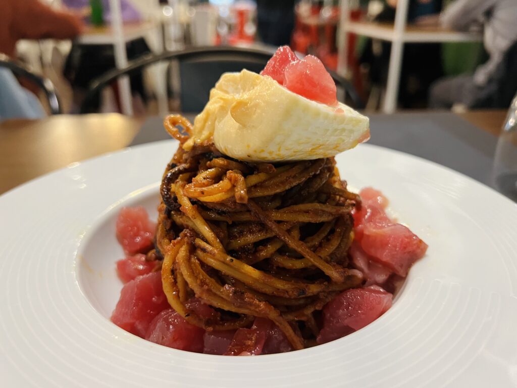 Urban Bistrot Asassineria’s 'full house' spaghetti all’assassina with tuna tartare and smoked burrata. Photo copyright the Puglia Guys.