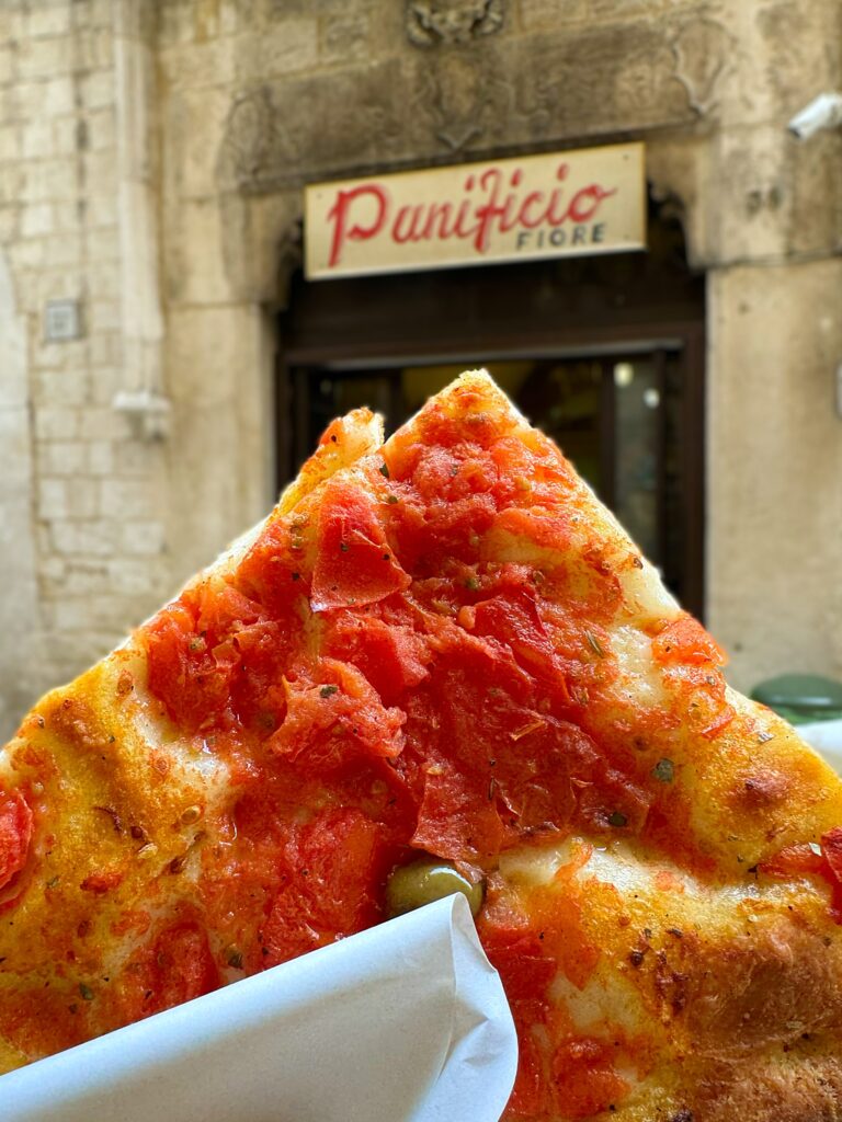 The ultimate Bari street food: focaccia barese. From Panificio Fiore. Photo the Puglia Guys