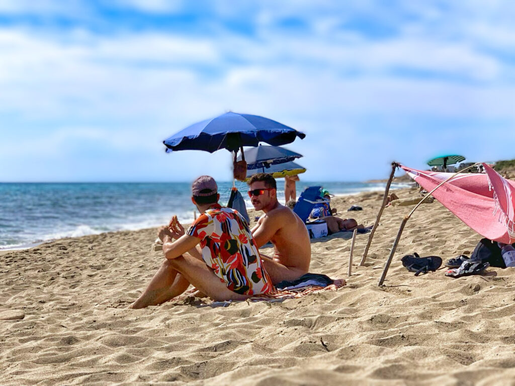 Surviving Italy’s Caronte Heat Storm: Top Tips to Stay Cool And Enjoy Your Summer - make your own shade. Photo by the Puglia Guys. D’Ayala naturist beach, Campomarino.