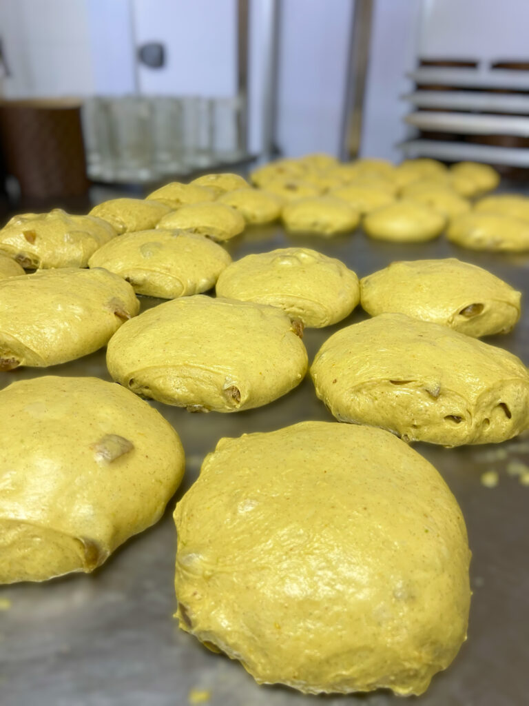 The panettone bread dough is left to rise. Panettone - traditional and three chocolate artisan panettone from Emalu pasticceria in Puglia. From the Puglia Guys Guide to Panettone, Italy’s traditional Christmas cake. Eat Puglia with the Puglia Guys.