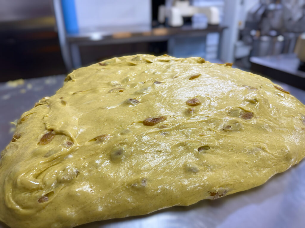 The panettone bread dough is ready for the mould. Panettone - traditional and three chocolate artisan panettone from Emalu pasticceria in Puglia. From the Puglia Guys Guide to Panettone, Italy’s traditional Christmas cake. Eat Puglia with the Puglia Guys.