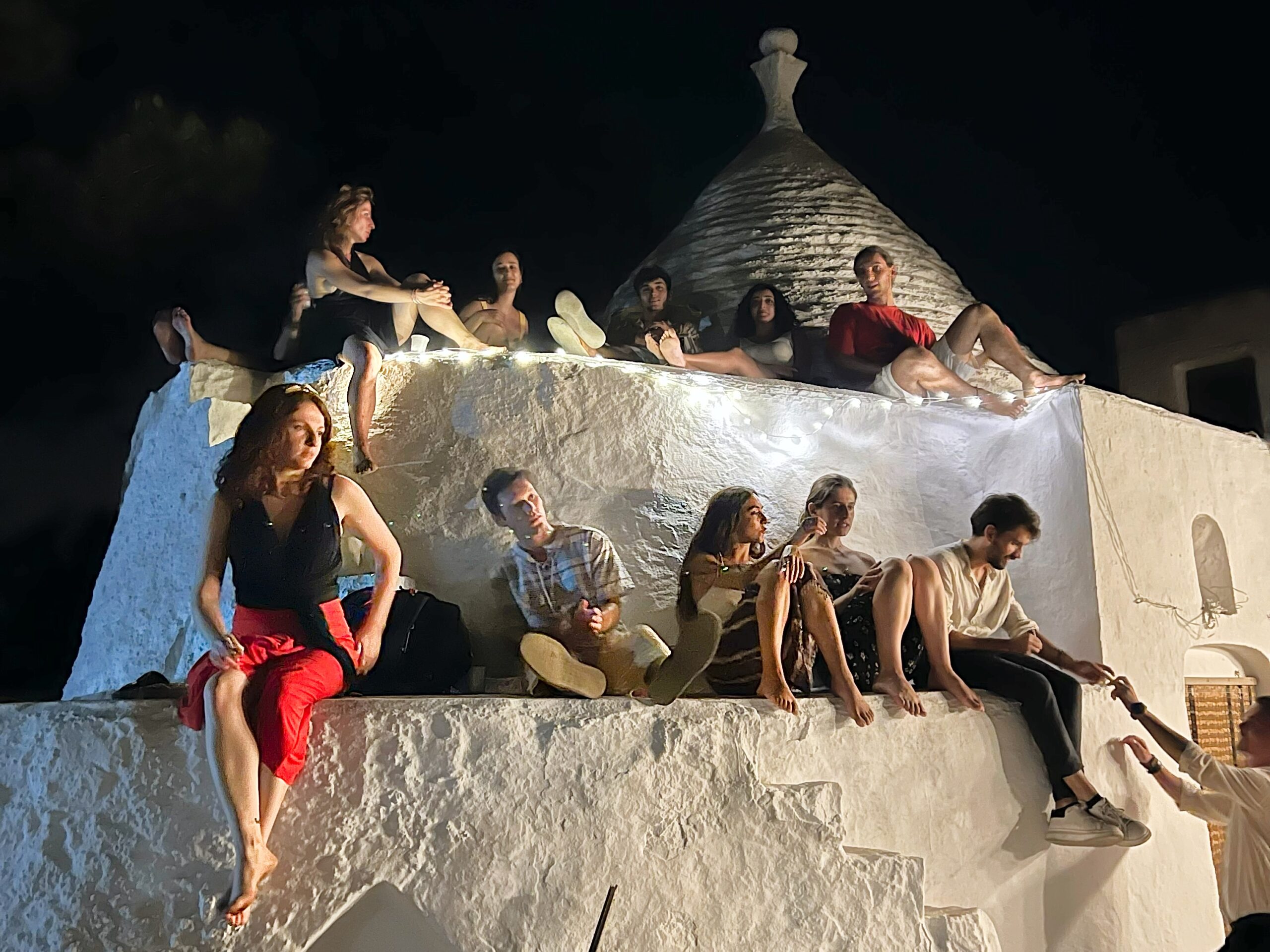 Pizzica watching on a trullo. Puglia Travel Trends 2024 by the Puglia Guys
